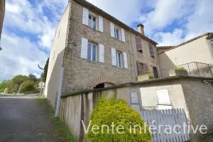 Maison de village avec garage et cour