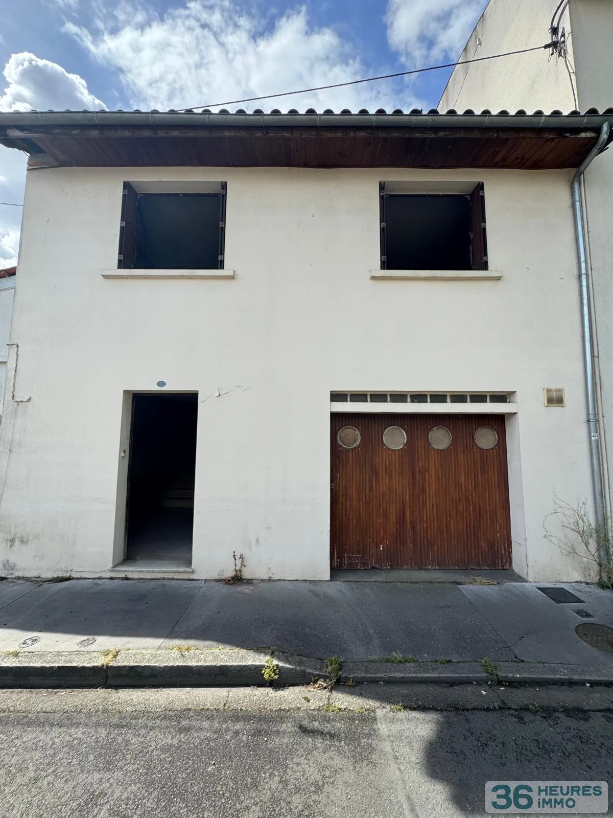 Maison années 60 à rénover avec grand garage et jardin exposé Sud