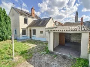 Maison à rénover - 61 m² avec garage et jardin