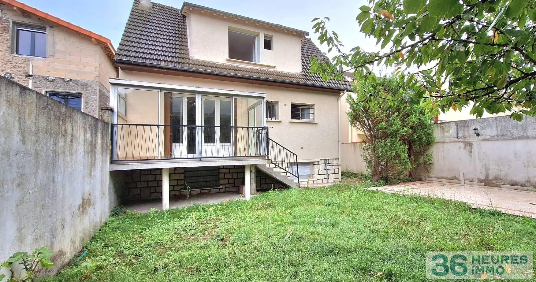 MAISON AVEC DEUX UNITÉS D'HABITATIONS 