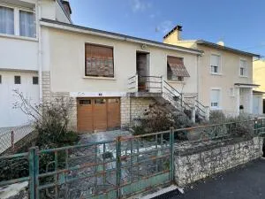 MAISON SUR SOUS SOL AVEC JARDIN