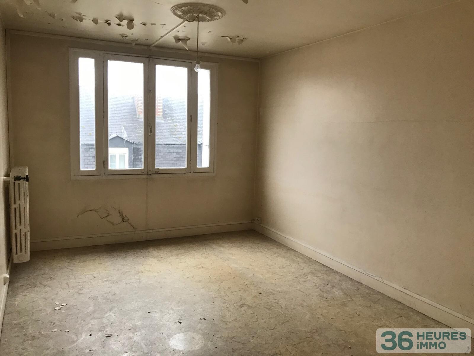 RUE AUVRAY - APPARTEMENT DERNIER ETAGE A RENOVER