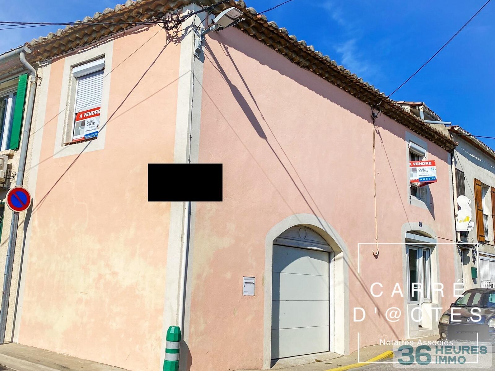 Maison de ville avec petit patio et garage