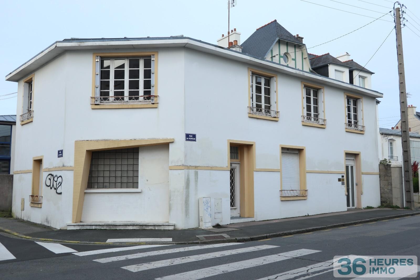 Immeuble avec un local professionnel et deux apparetements