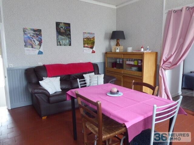 Terrain a bâtir avec petite maison