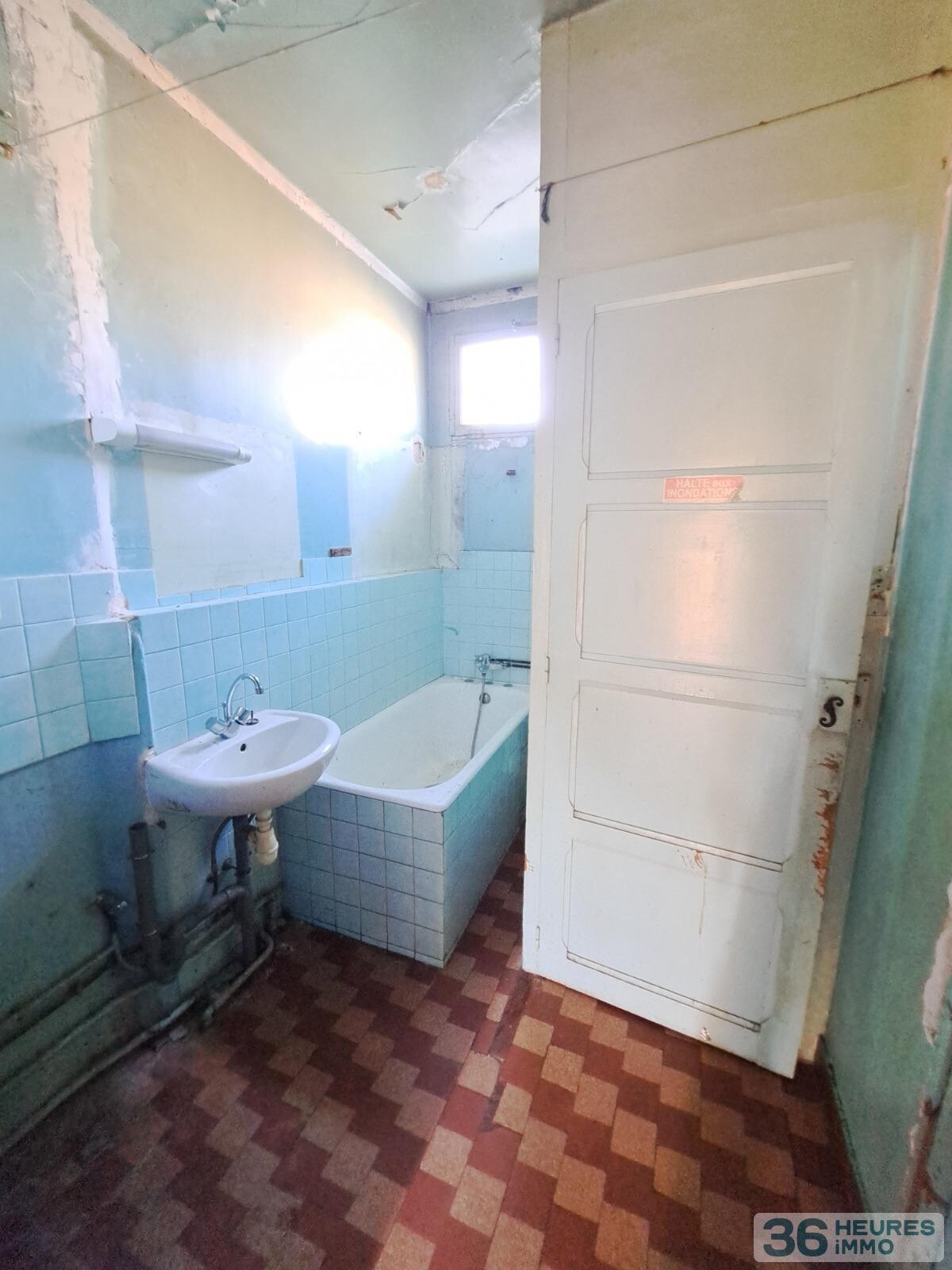 Rue de la fraternite - maison a renover - plain pied - avec garage et jardin 