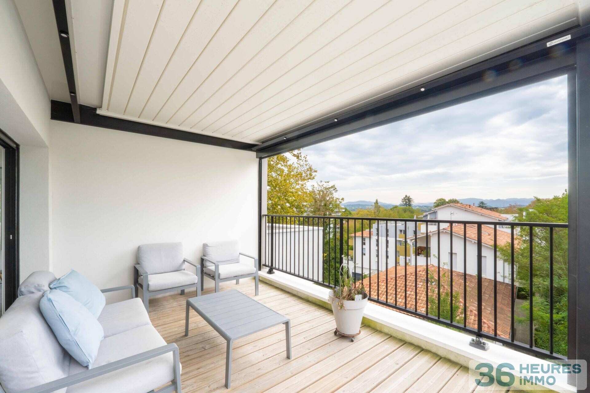 Appartement t4 , triple terrasse  avec vue montagne