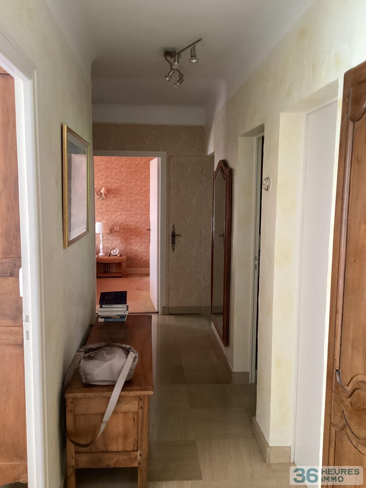 Pavillon style ile de france sur sous-sol avec partie de terrain constructible