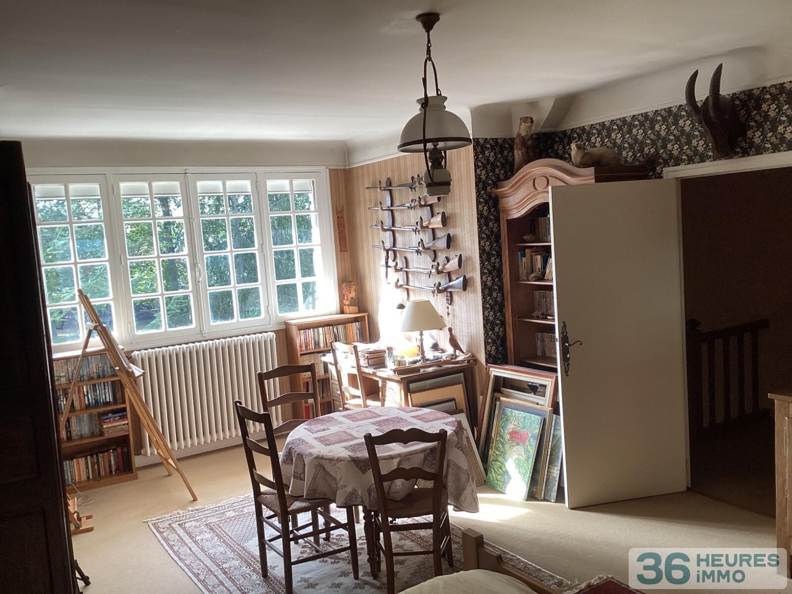 Pavillon style ile de france sur sous-sol avec partie de terrain constructible