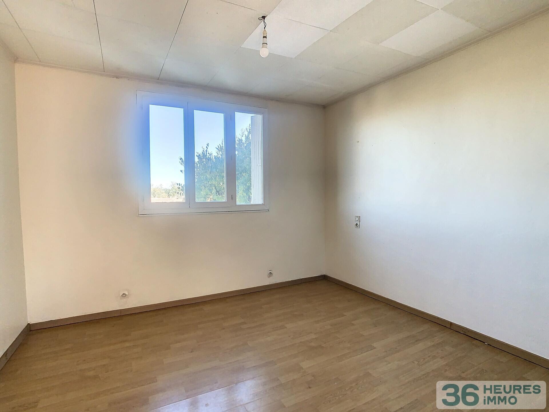 Appartement type 3 à rénover et garage