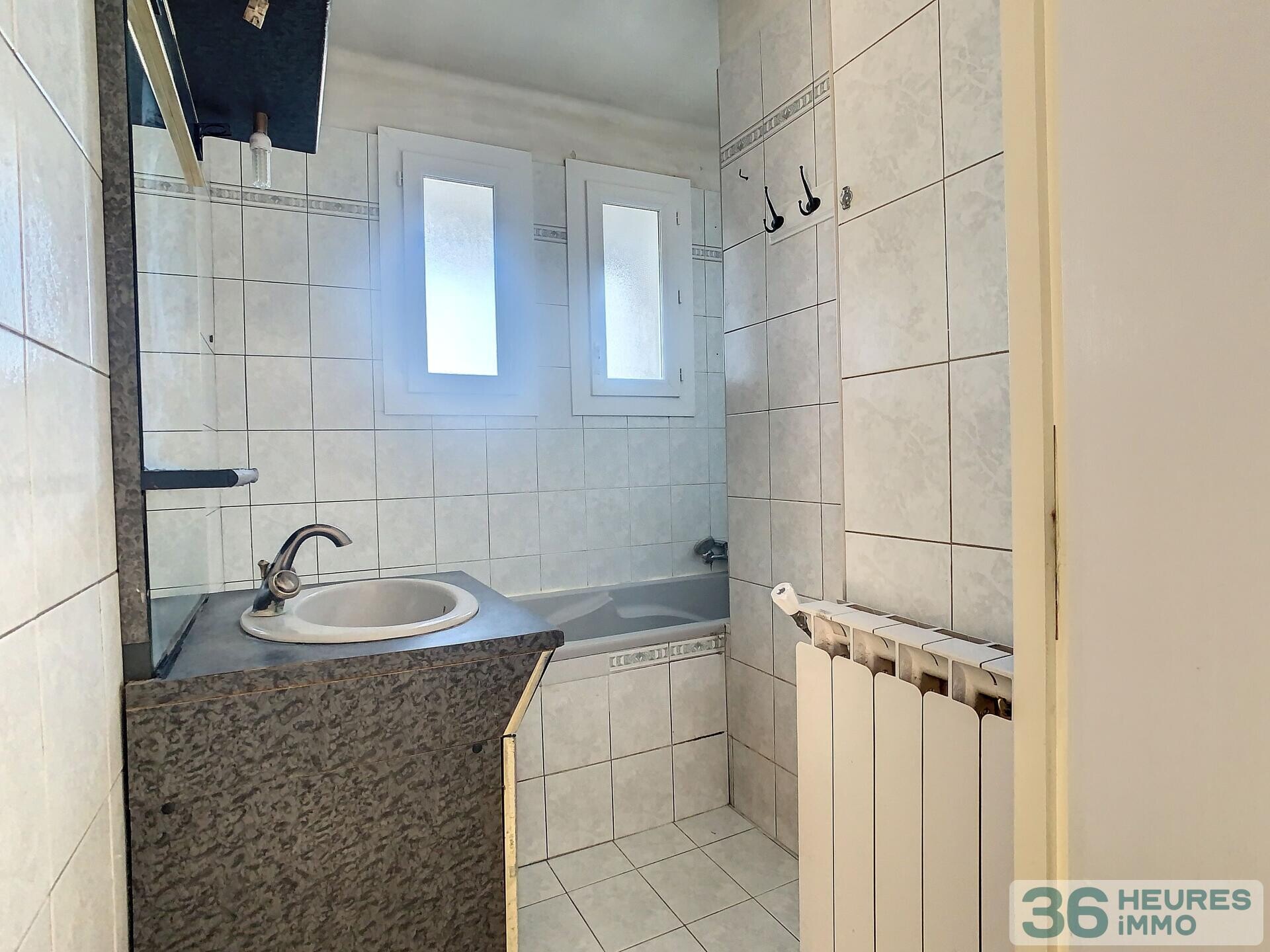 Appartement type 3 à rénover et garage