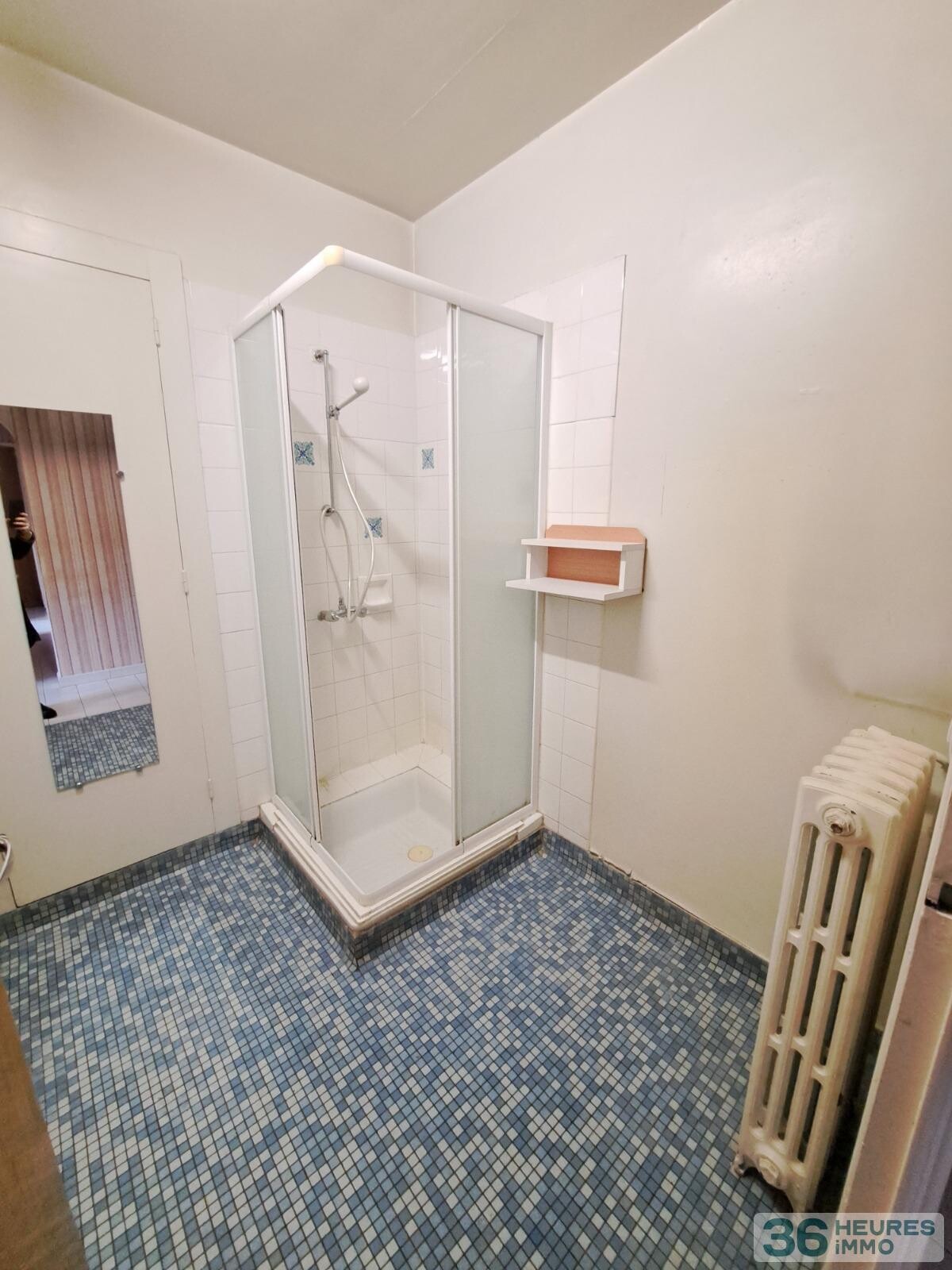 APPARTEMENT AVEC GARAGE ET JARDIN 