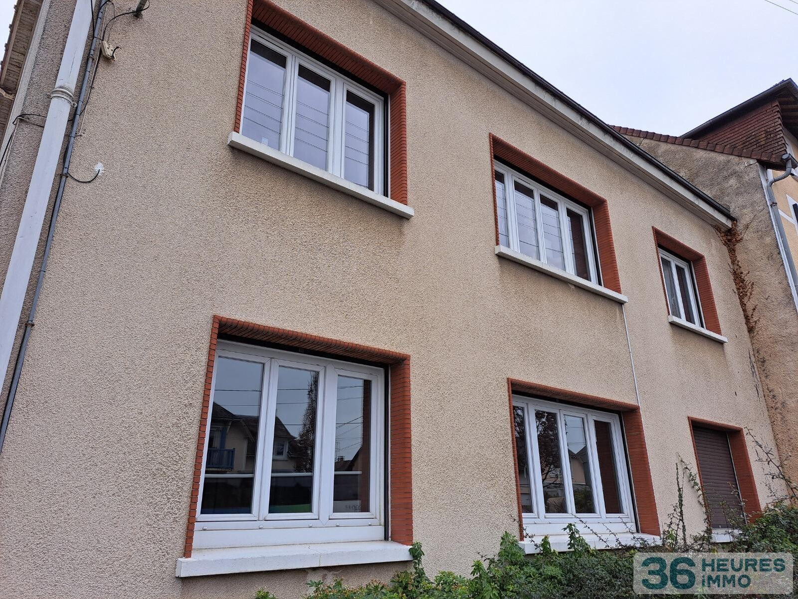 APPARTEMENT AVEC GARAGE ET JARDIN 