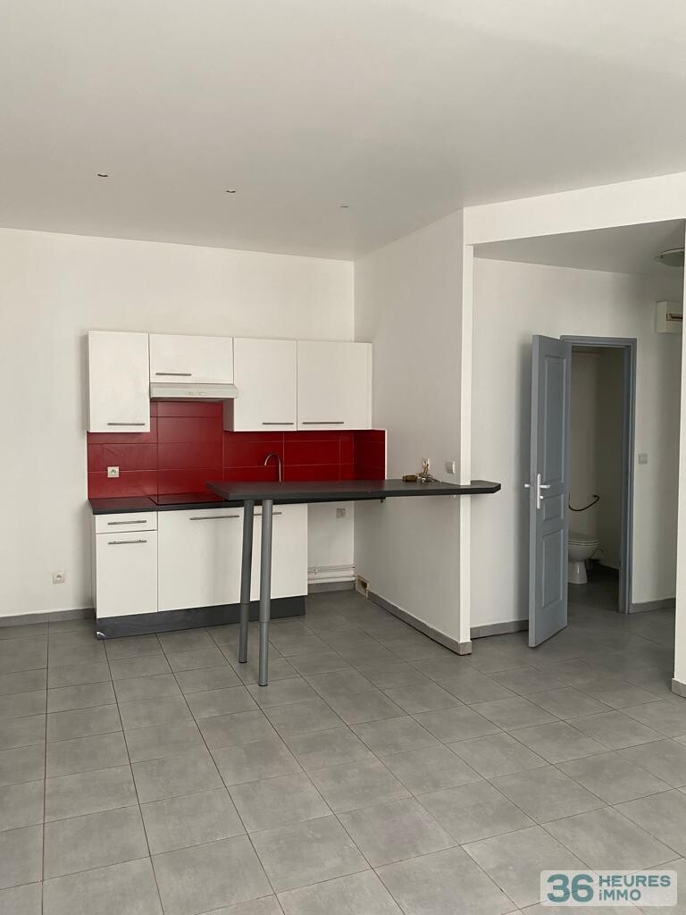 Immeuble 210 m² - 4 appartements + Local commercial + Cave - Centre ville -