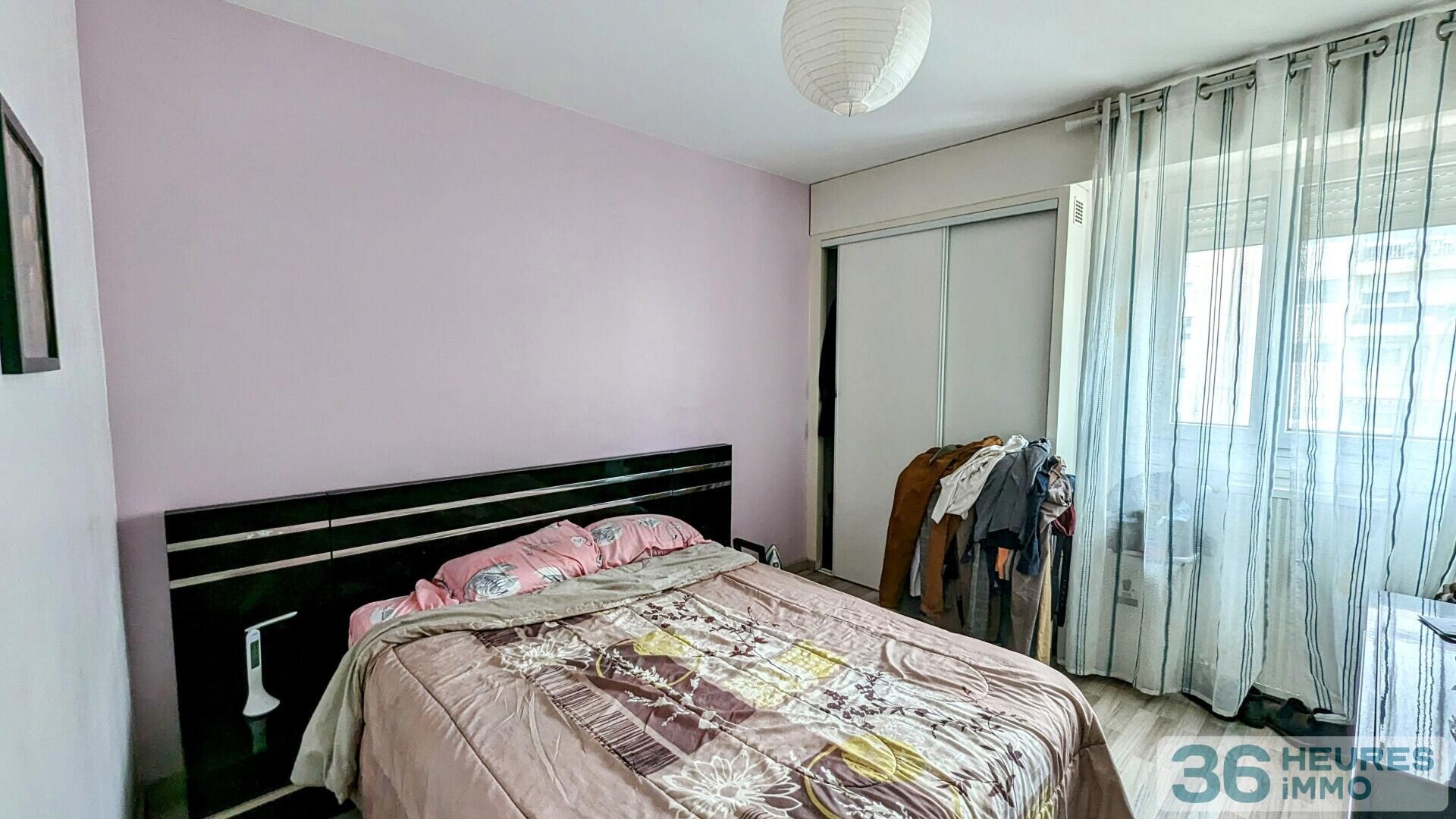 Appartement de pratiquement 90m² avec balcon, buanderie et cave