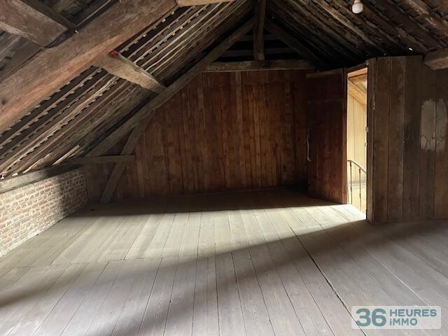 Dans un bourg tous commerces à proximité de HONFLEUR .