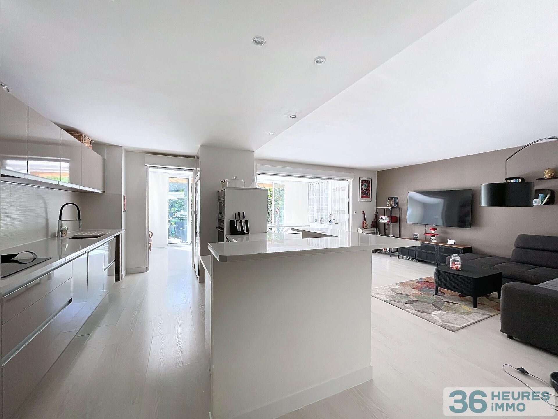 Appartement T3 avec jardin, parking et garage 