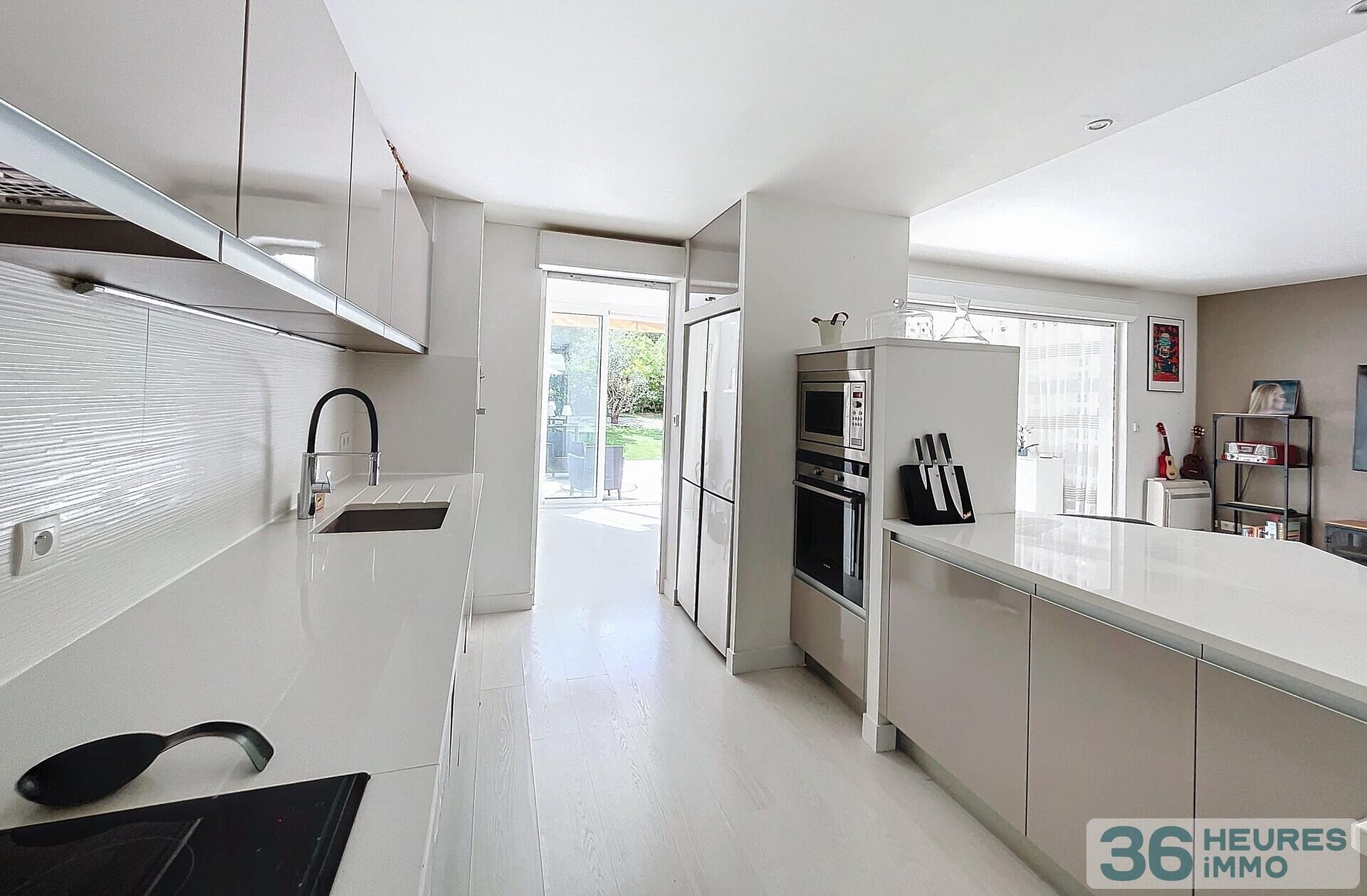 Appartement T3 avec jardin, parking et garage 