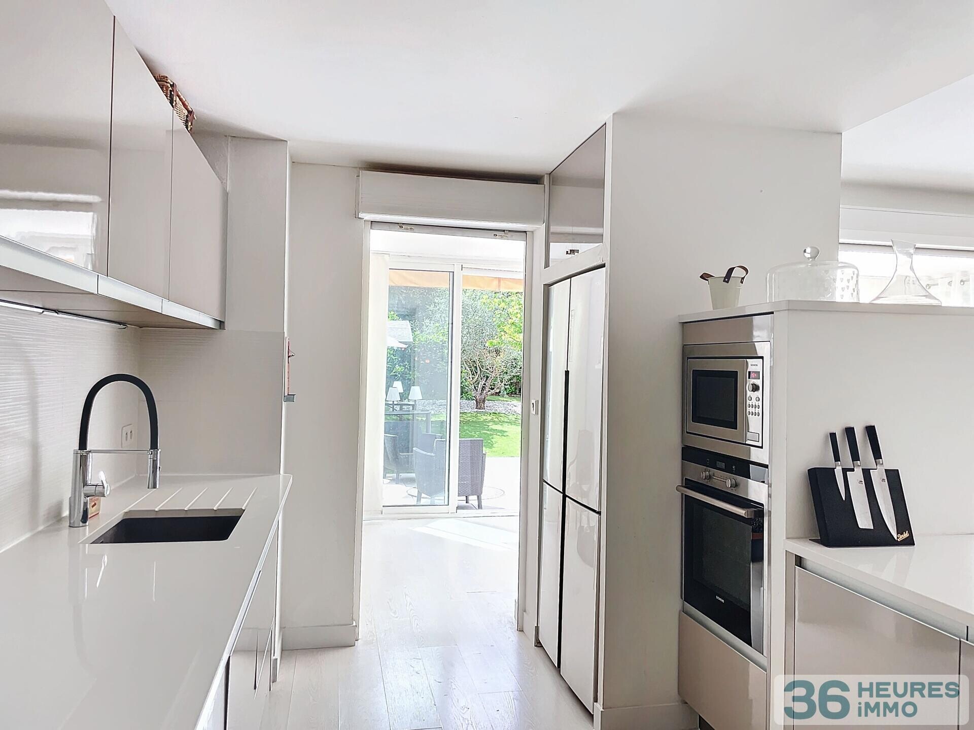 Appartement T3 avec jardin, parking et garage 