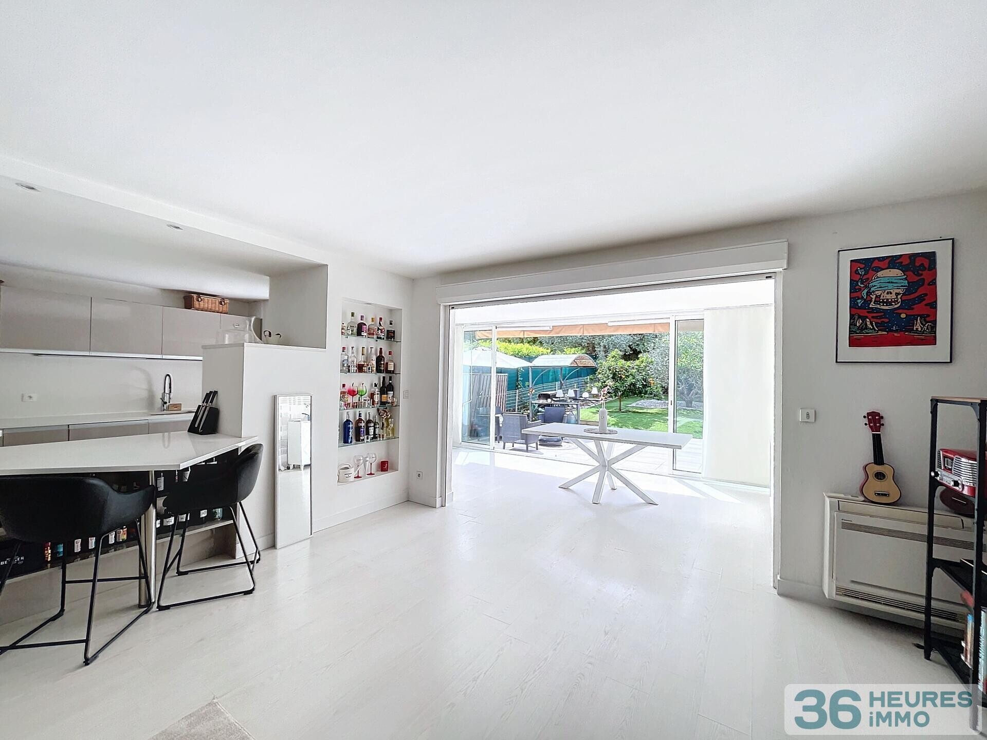 Appartement T3 avec jardin, parking et garage 