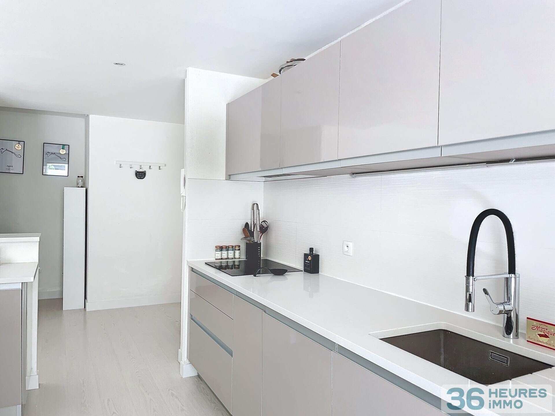 Appartement T3 avec jardin, parking et garage 