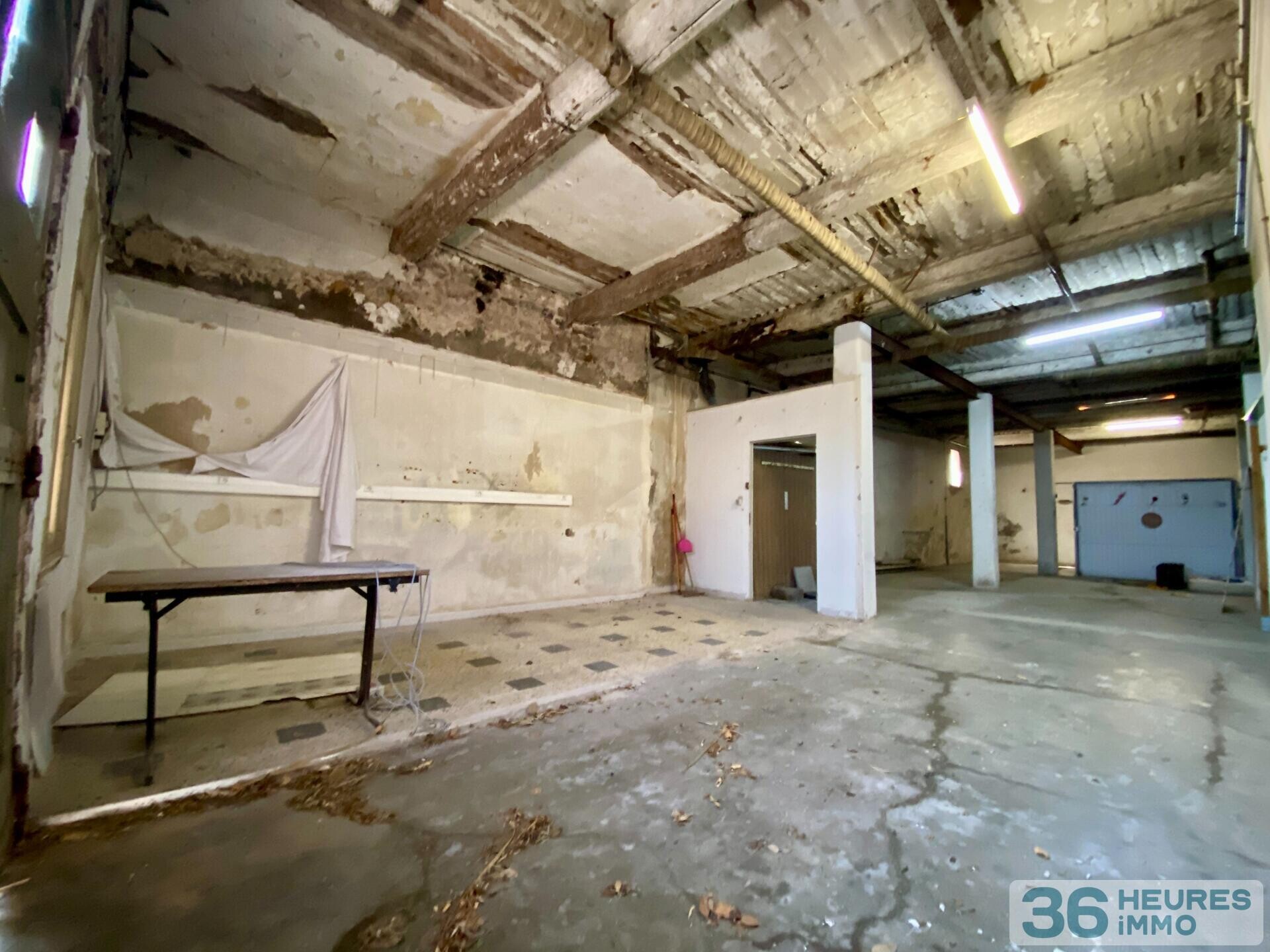 Immeuble à rénover 5 apt + terrain constructible