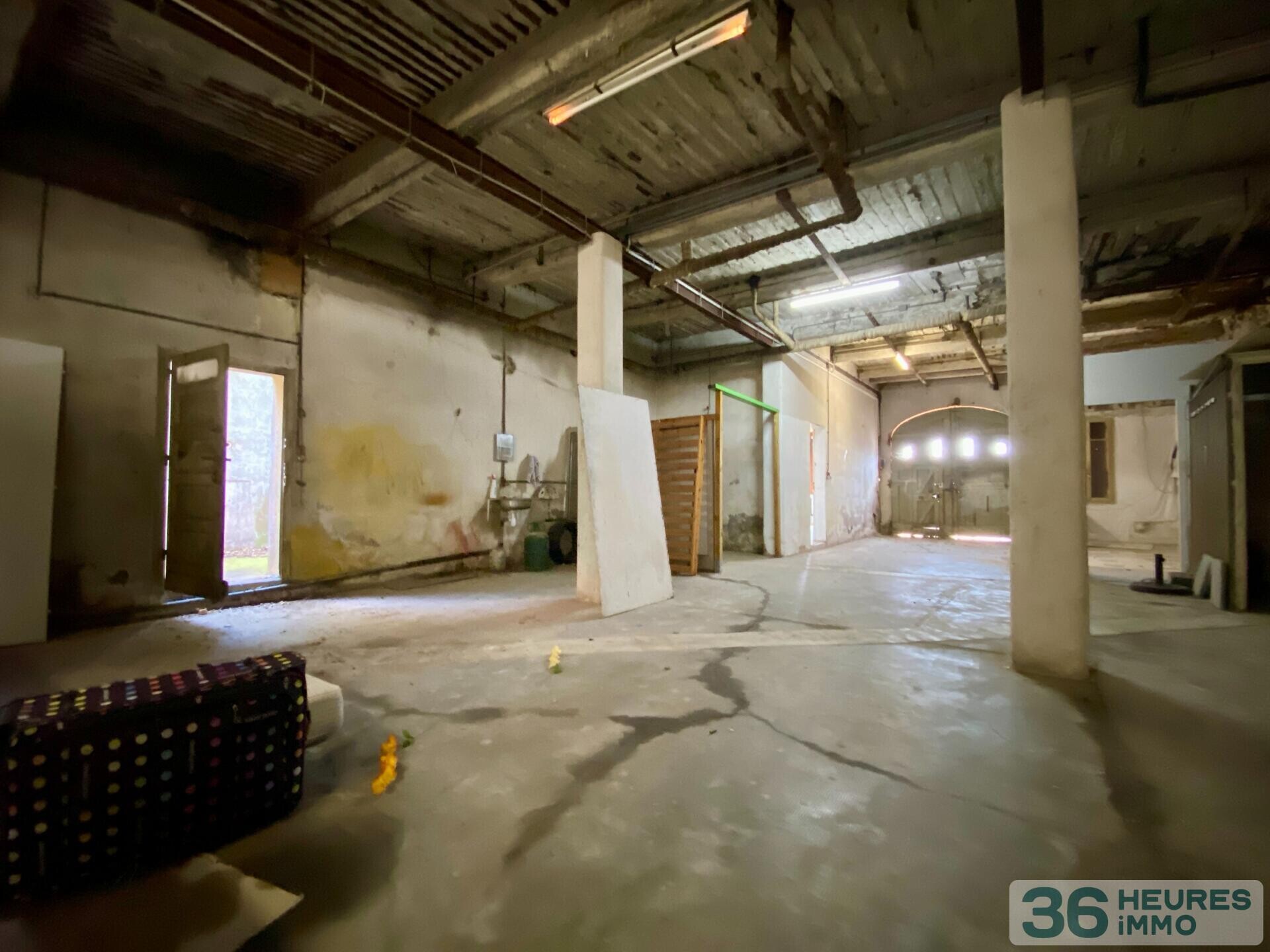 Immeuble à rénover 5 apt + terrain constructible