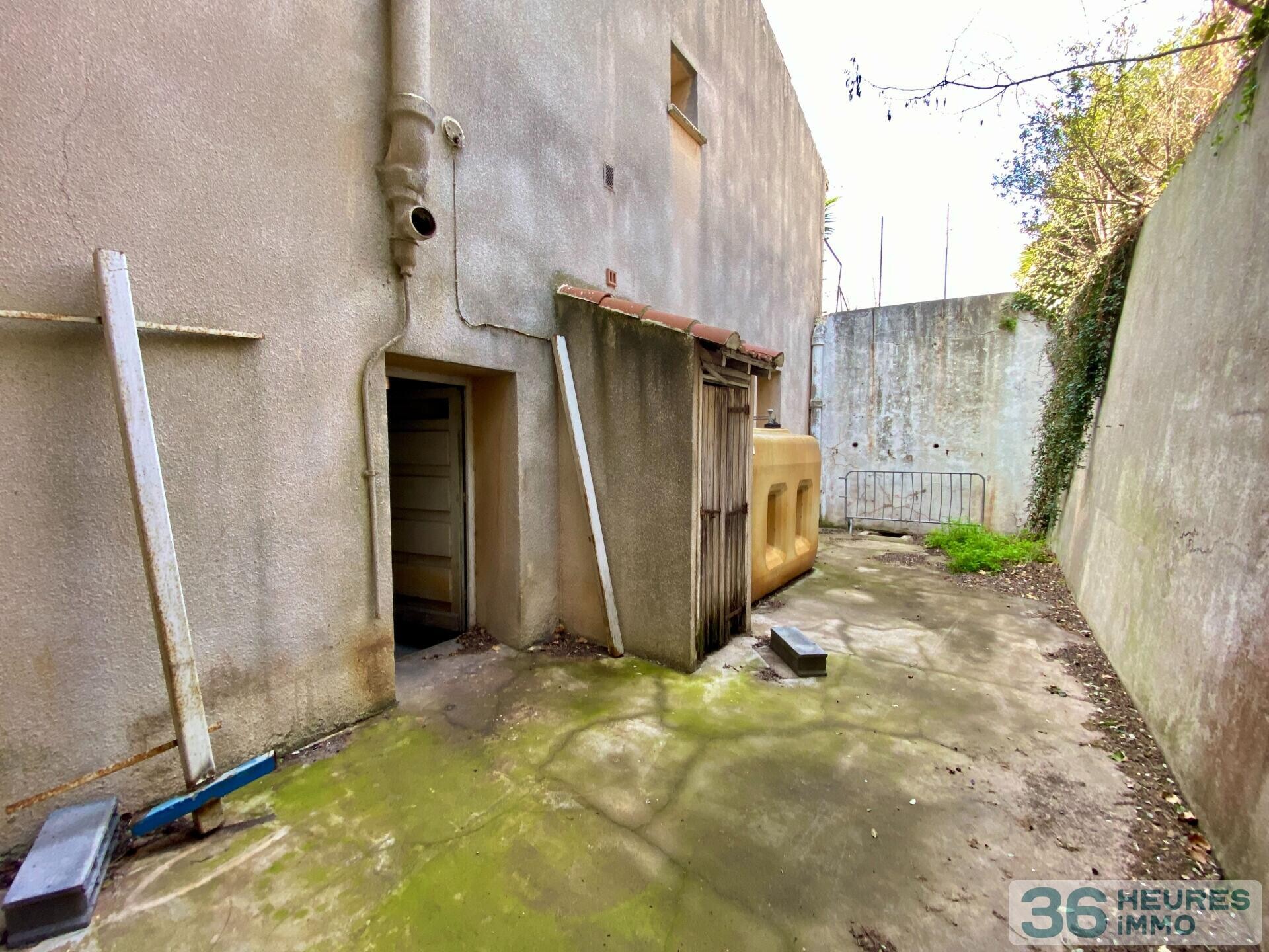 Immeuble à rénover 5 apt + terrain constructible