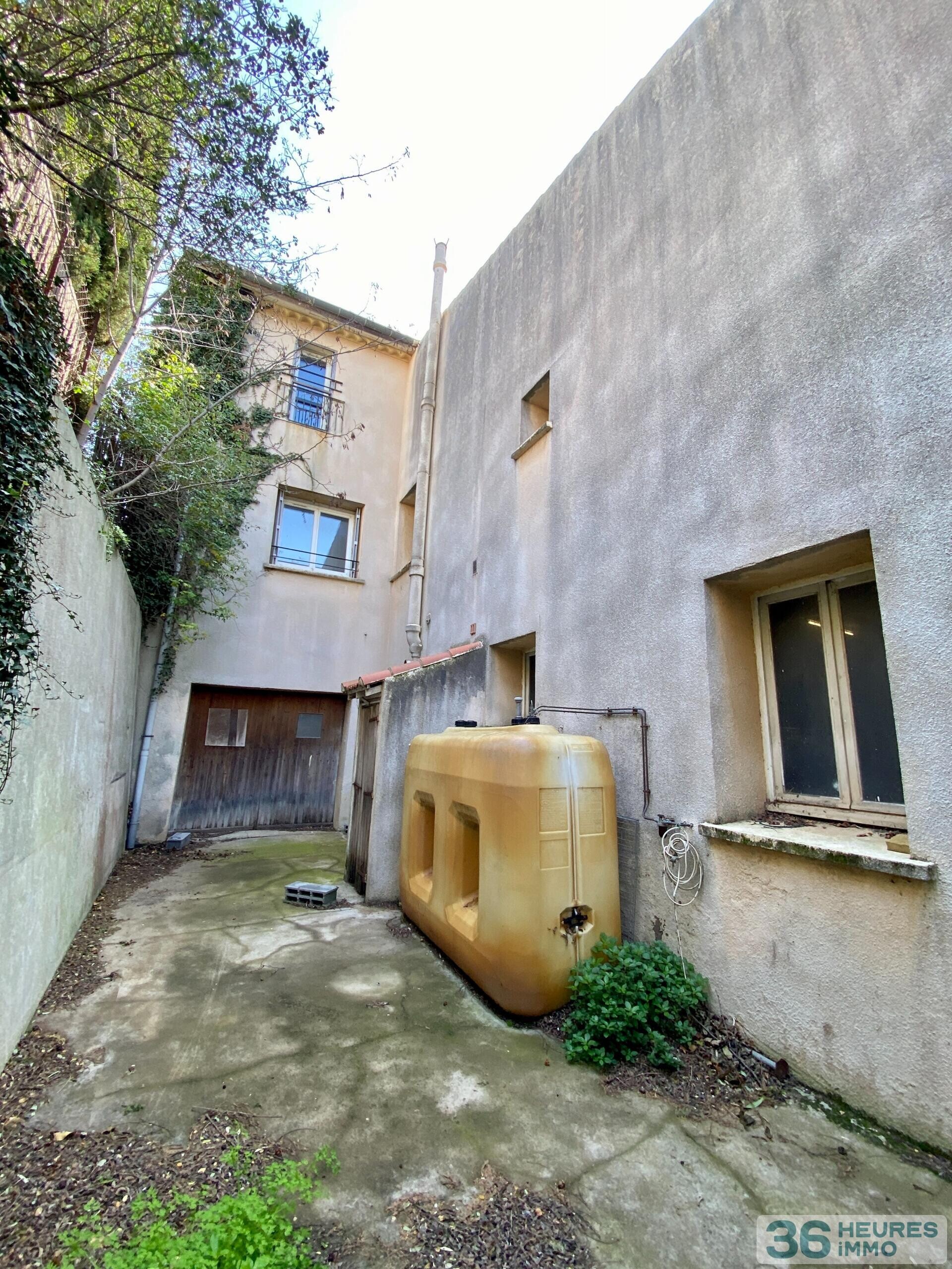 Immeuble à rénover 5 apt + terrain constructible