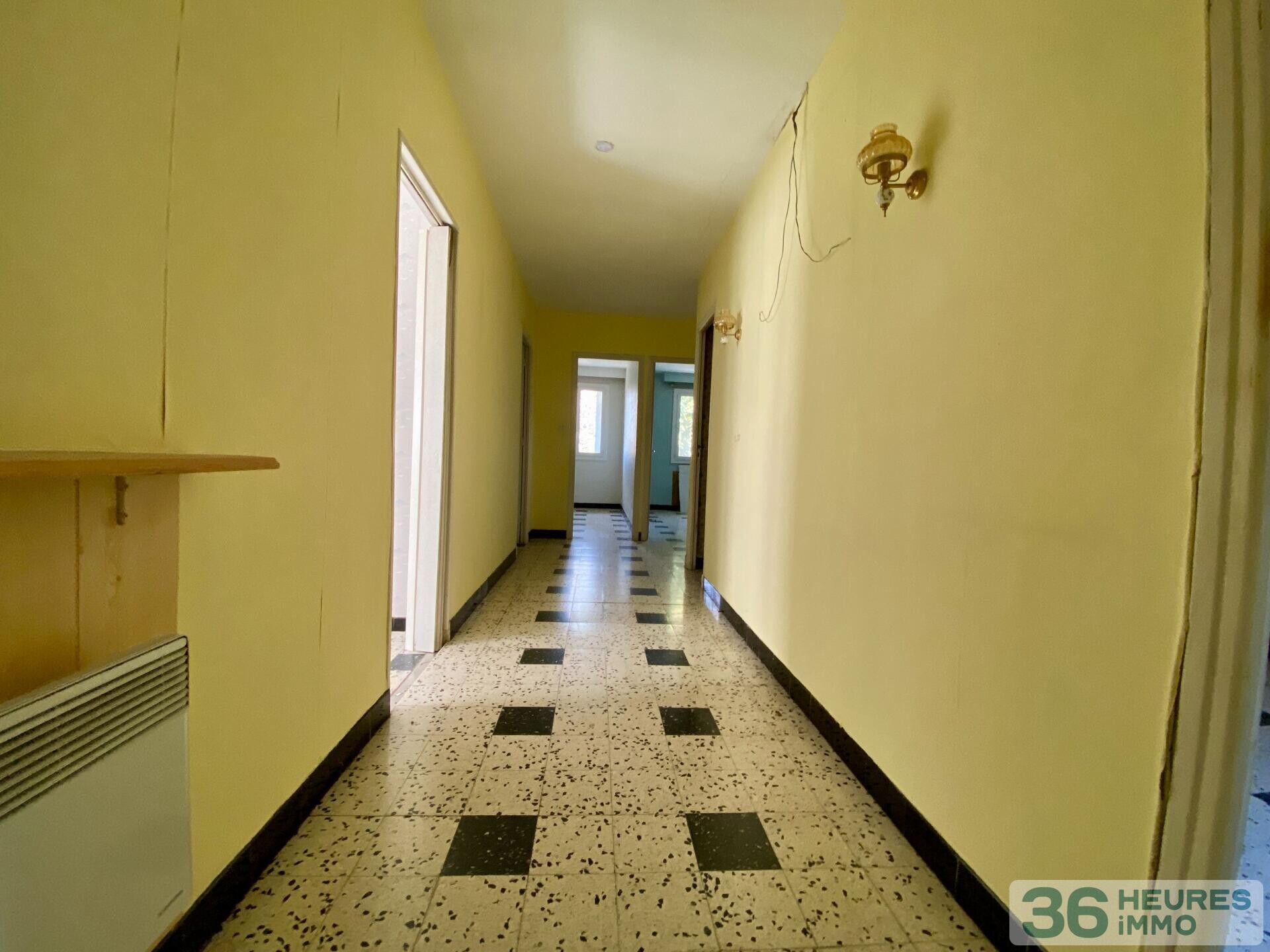 Immeuble à rénover 5 apt + terrain constructible