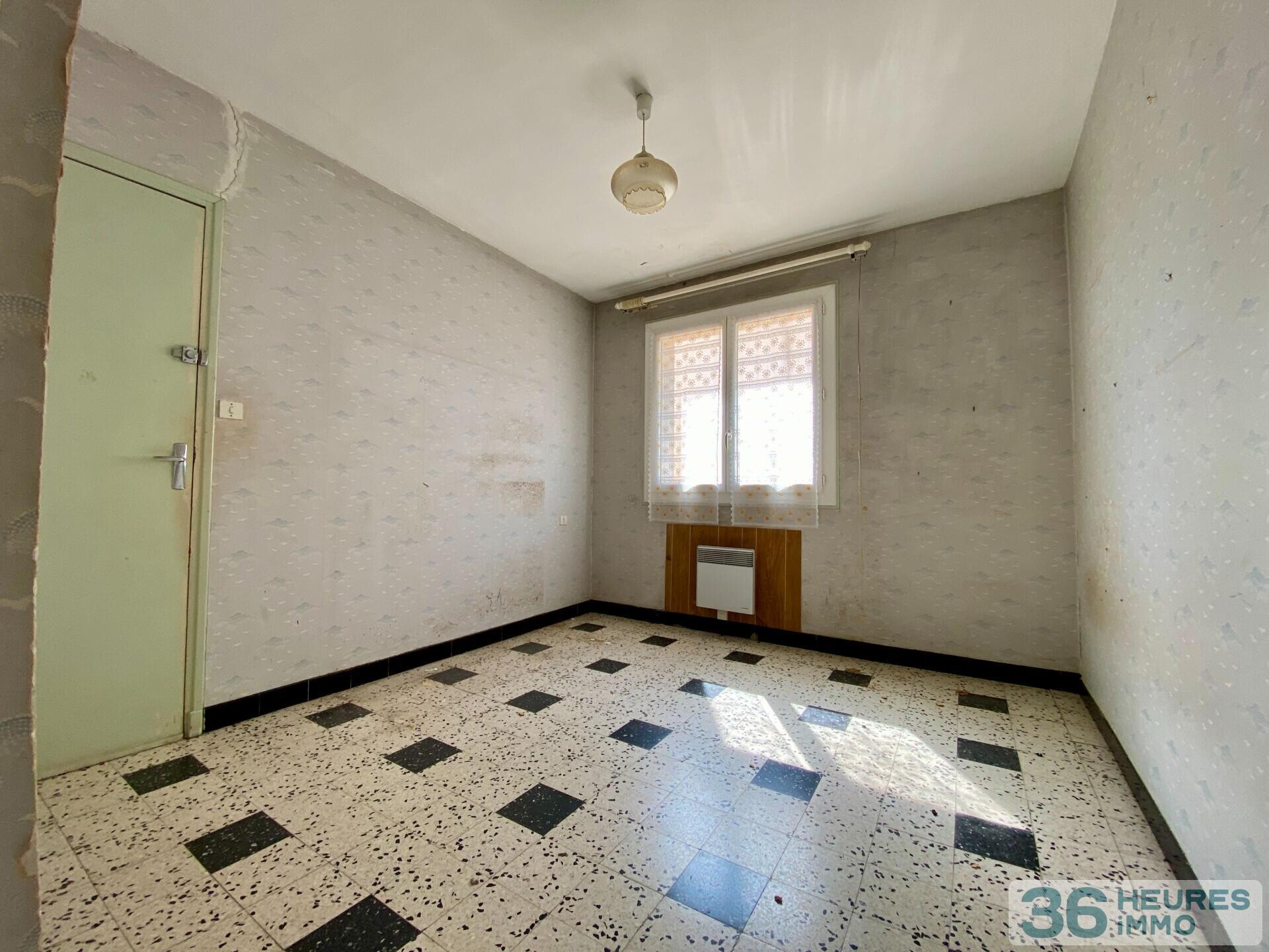 Immeuble à rénover 5 apt + terrain constructible