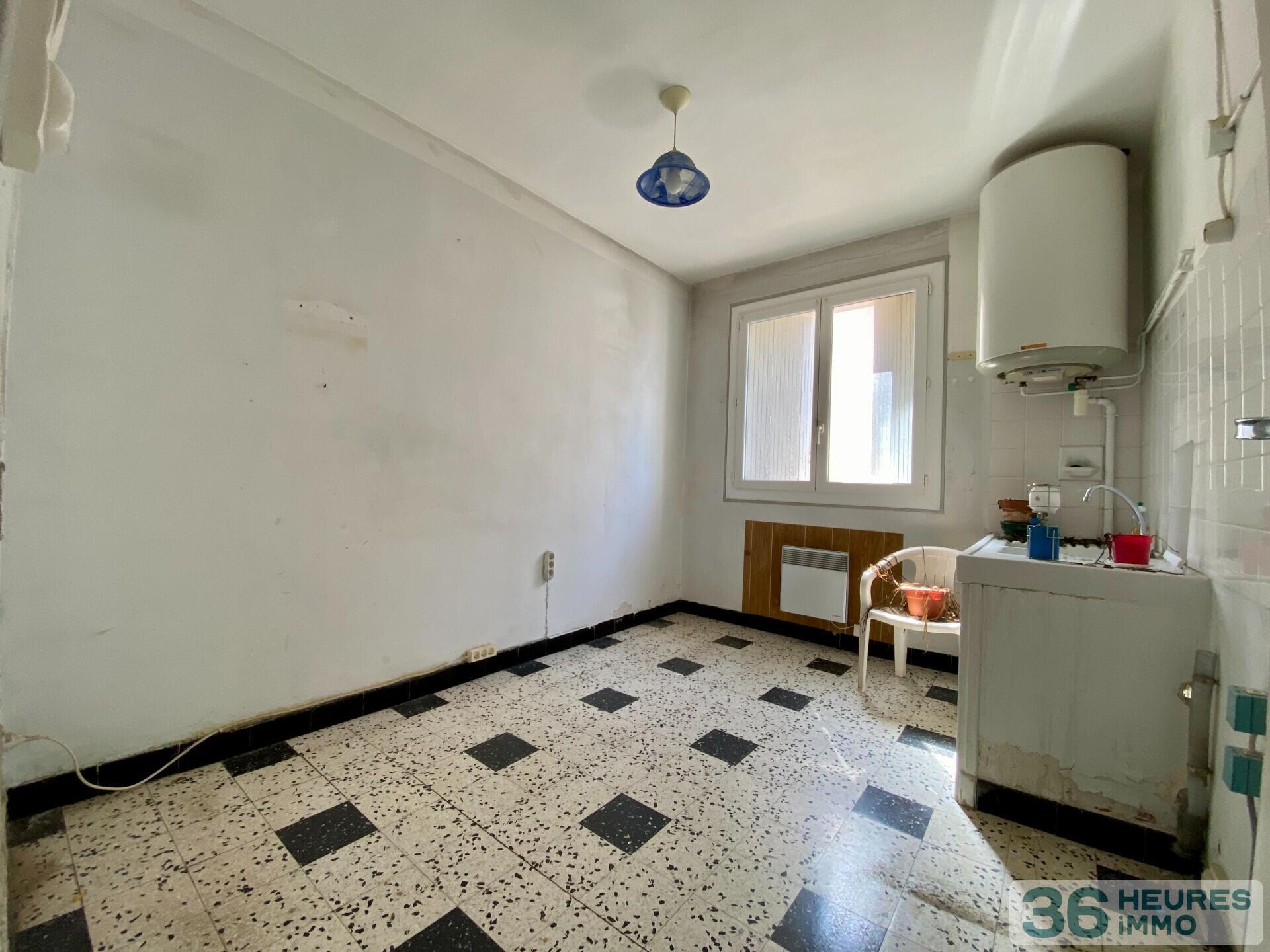 Immeuble à rénover 5 apt + terrain constructible