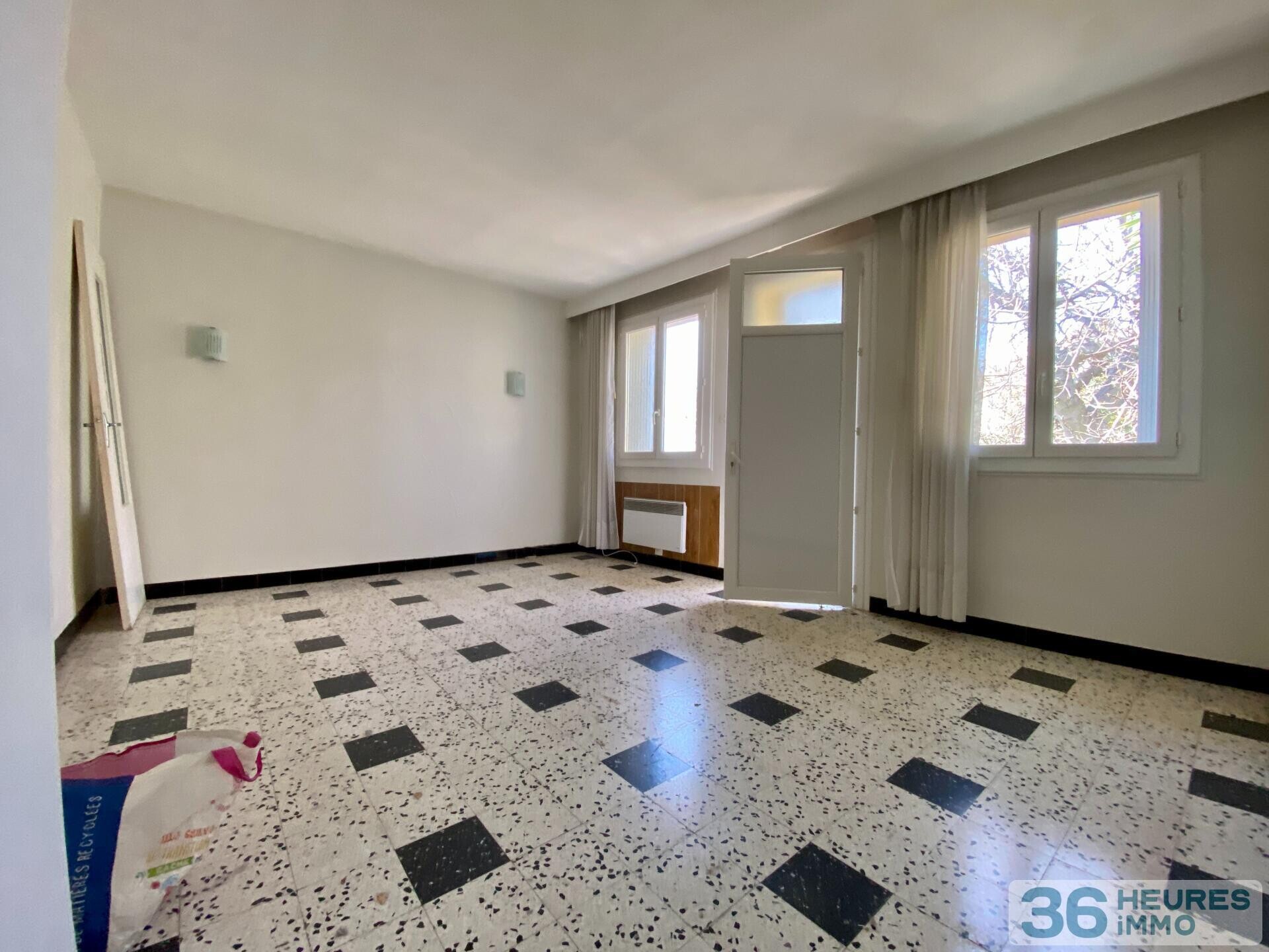 Immeuble à rénover 5 apt + terrain constructible