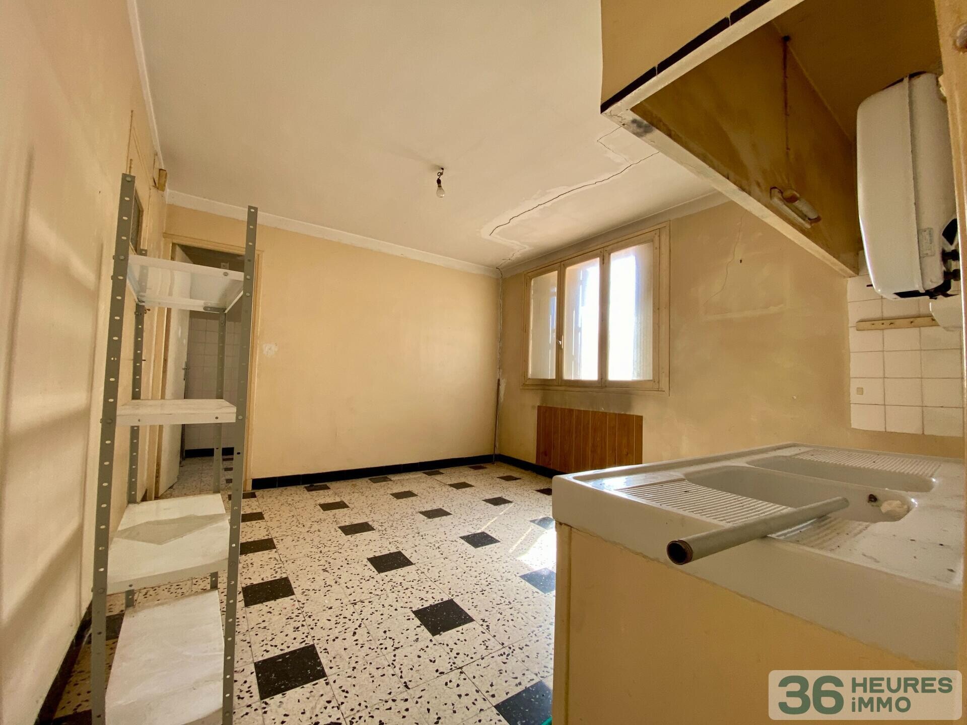 Immeuble à rénover 5 apt + terrain constructible