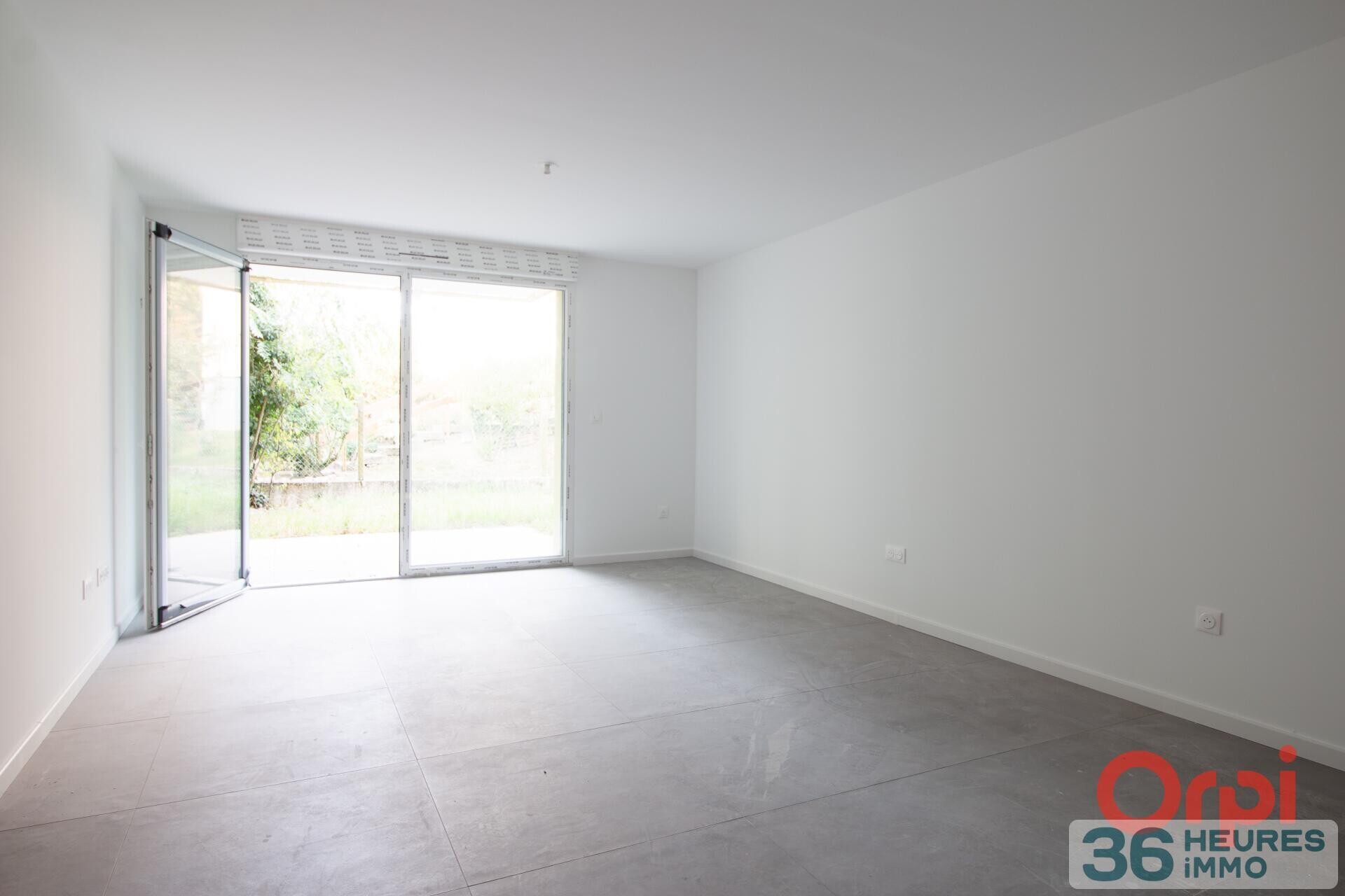  Appartement rez-de-jardin avec cave + parking