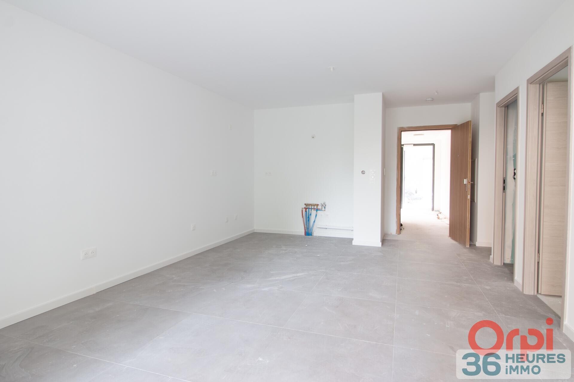  Appartement rez-de-jardin avec cave + parking