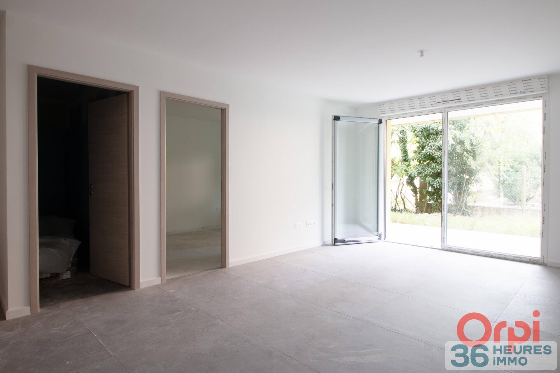  Appartement rez-de-jardin avec cave + parking