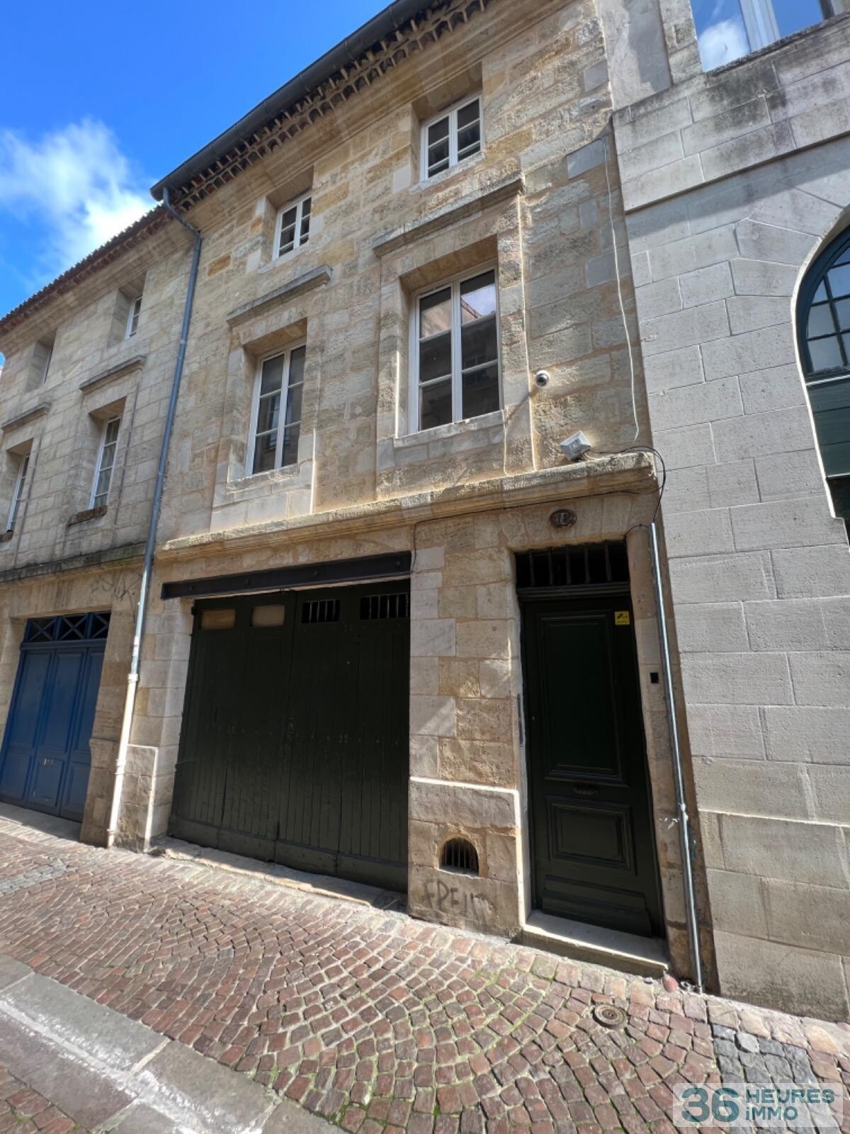 IMMEUBLE 5 APPARTEMENTS + 1 GARAGE+ CAVES 