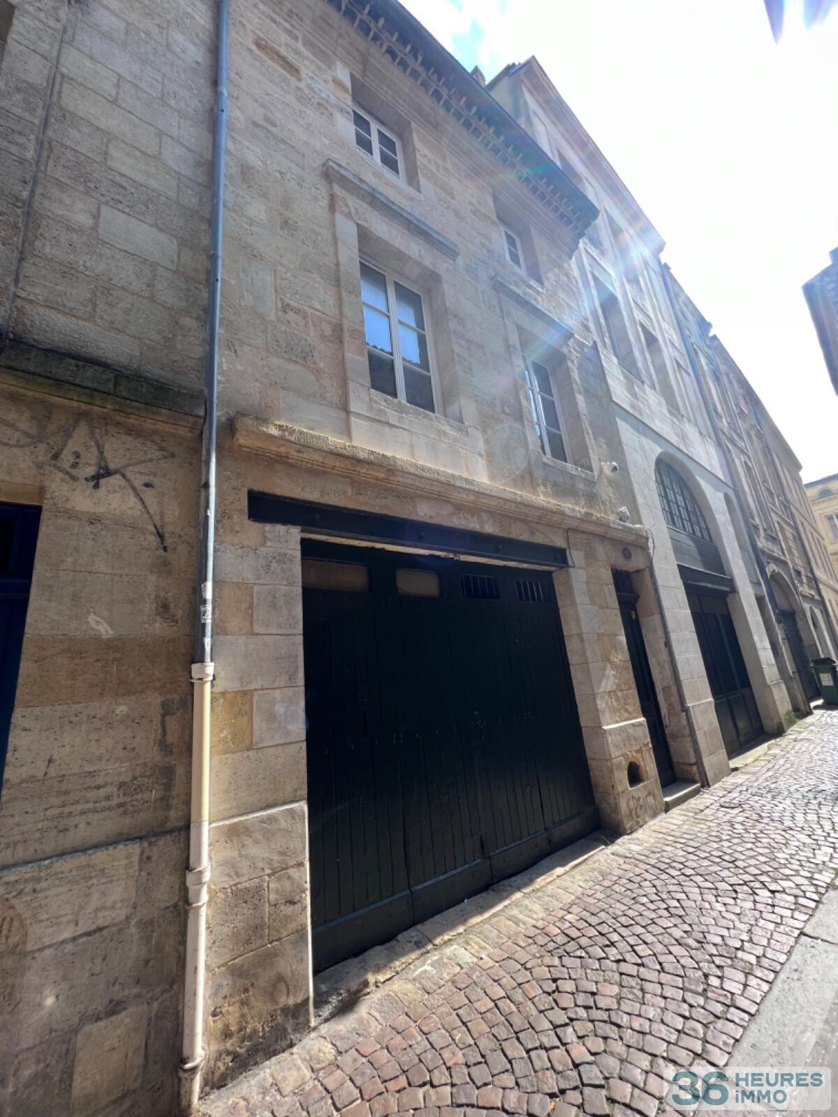 IMMEUBLE 5 APPARTEMENTS + 1 GARAGE+ CAVES 