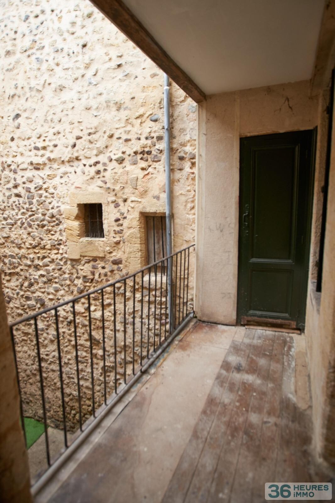 IMMEUBLE 5 APPARTEMENTS + 1 GARAGE+ CAVES 