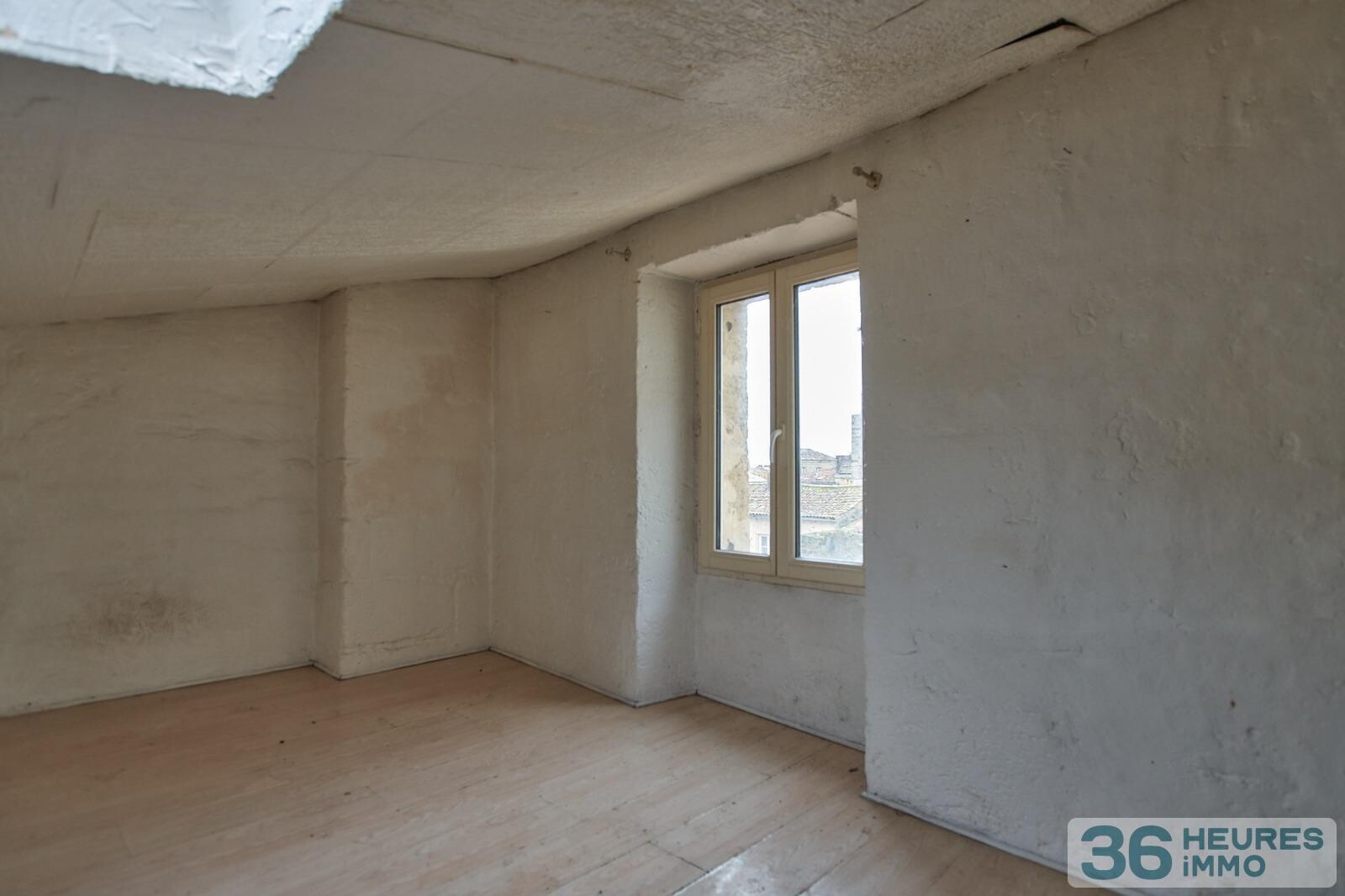 IMMEUBLE 5 APPARTEMENTS + 1 GARAGE+ CAVES 