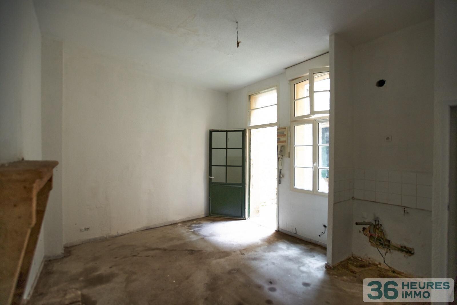 IMMEUBLE 5 APPARTEMENTS + 1 GARAGE+ CAVES 