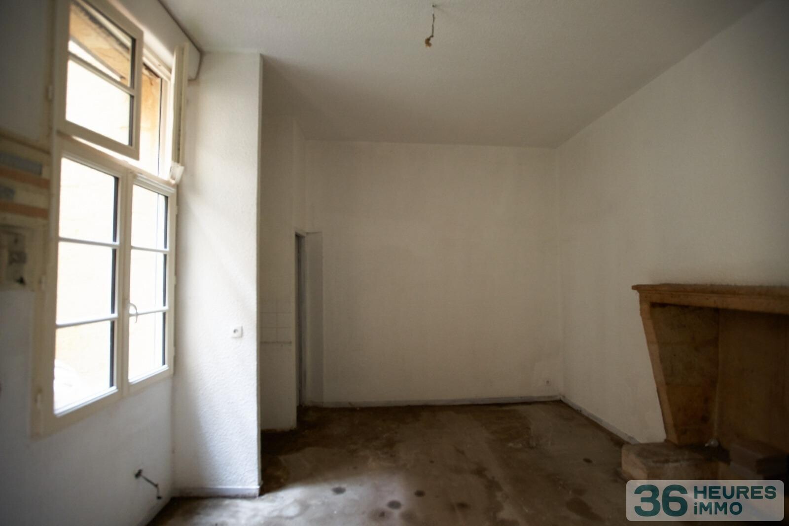 IMMEUBLE 5 APPARTEMENTS + 1 GARAGE+ CAVES 