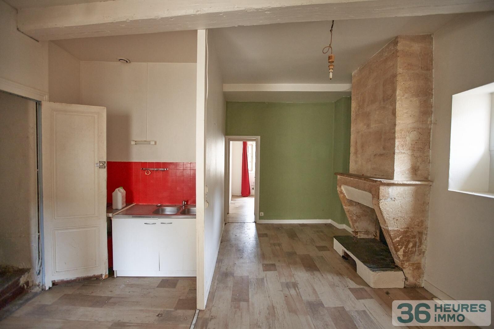 IMMEUBLE 5 APPARTEMENTS + 1 GARAGE+ CAVES 