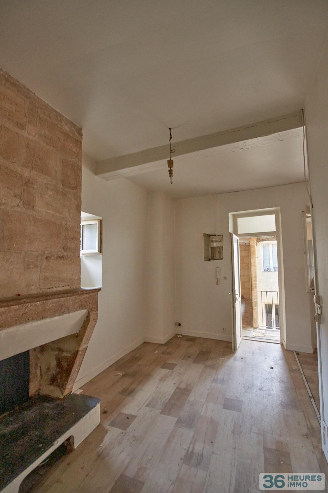 IMMEUBLE 5 APPARTEMENTS + 1 GARAGE+ CAVES 