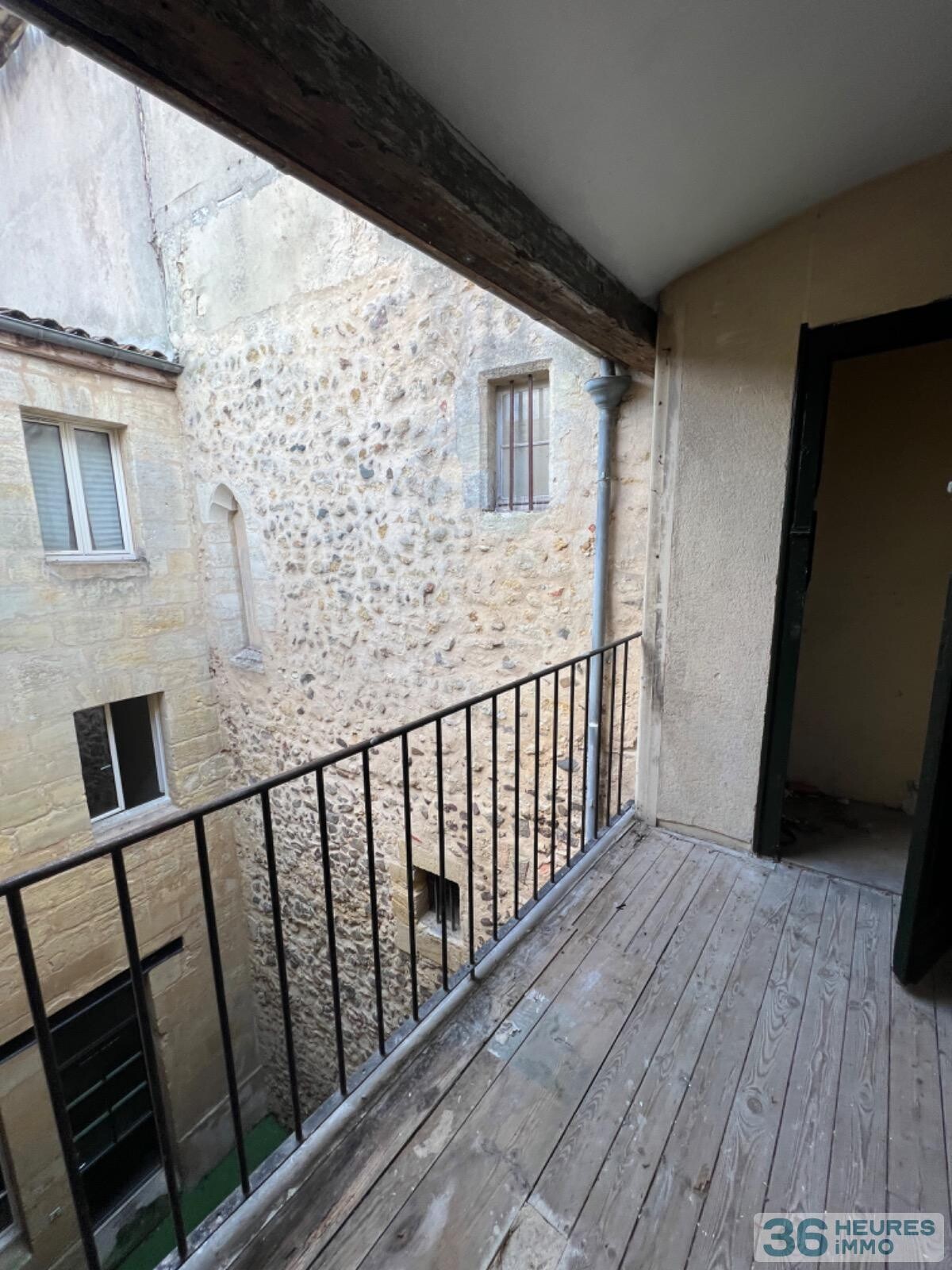 IMMEUBLE 5 APPARTEMENTS + 1 GARAGE+ CAVES 