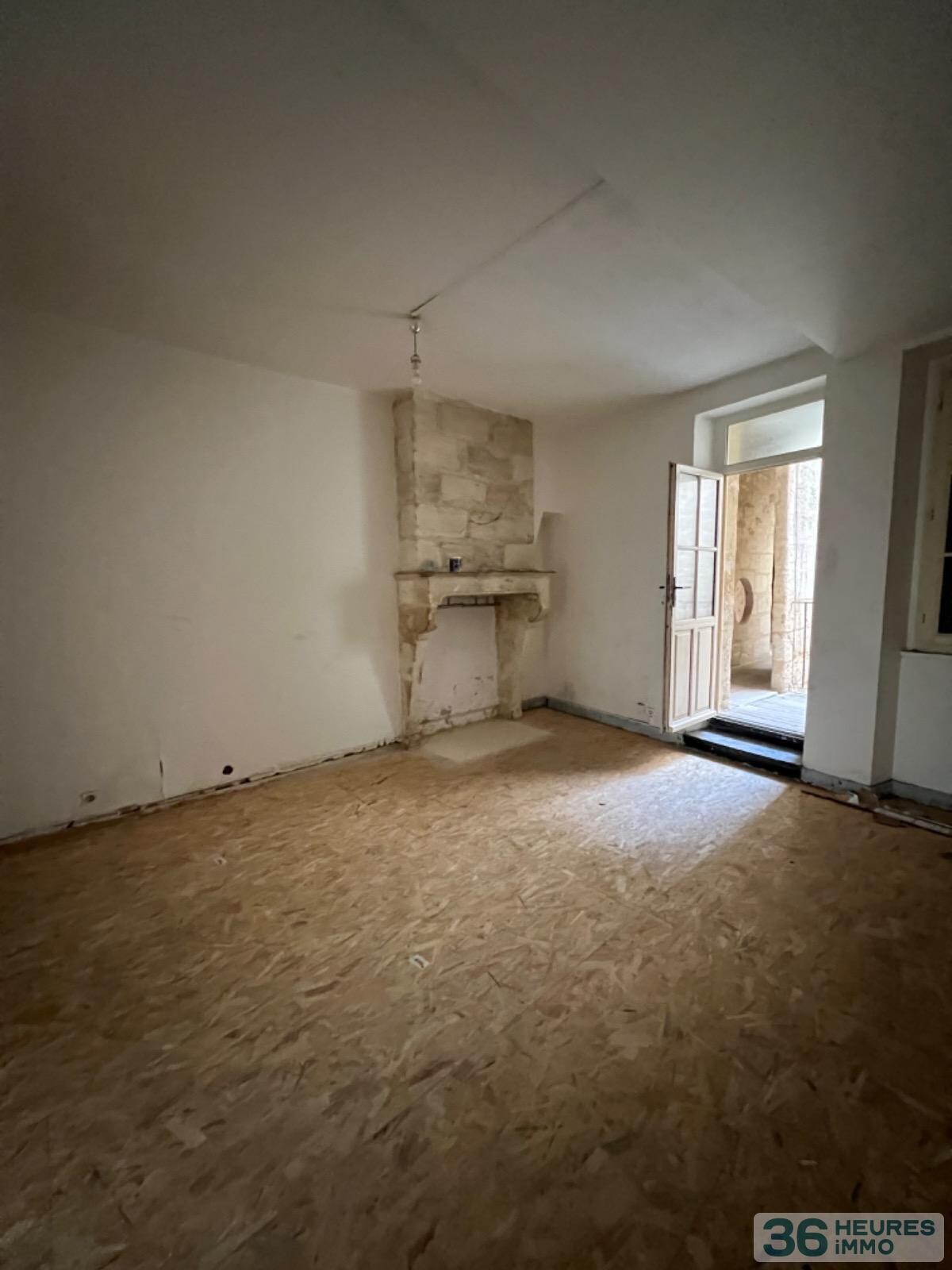 IMMEUBLE 5 APPARTEMENTS + 1 GARAGE+ CAVES 