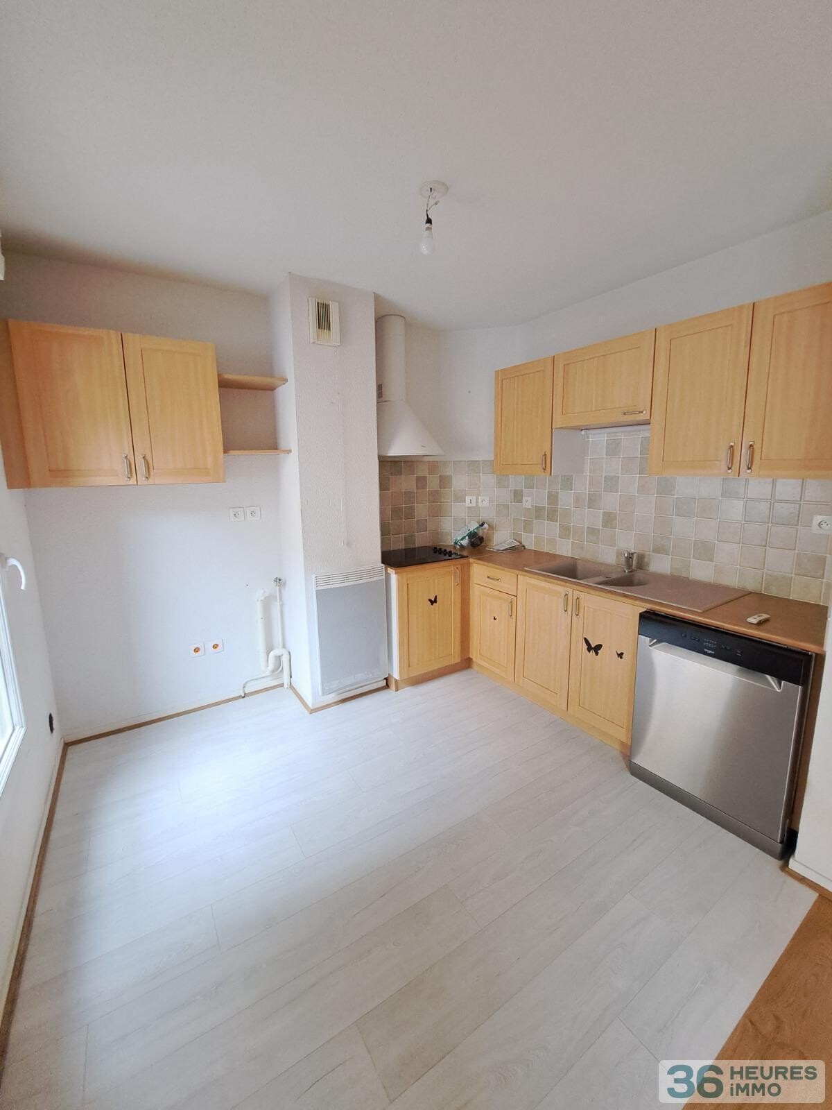 APPARTEMENT 2 CHAMBRES AVEC TERRASSE ET PARKING 