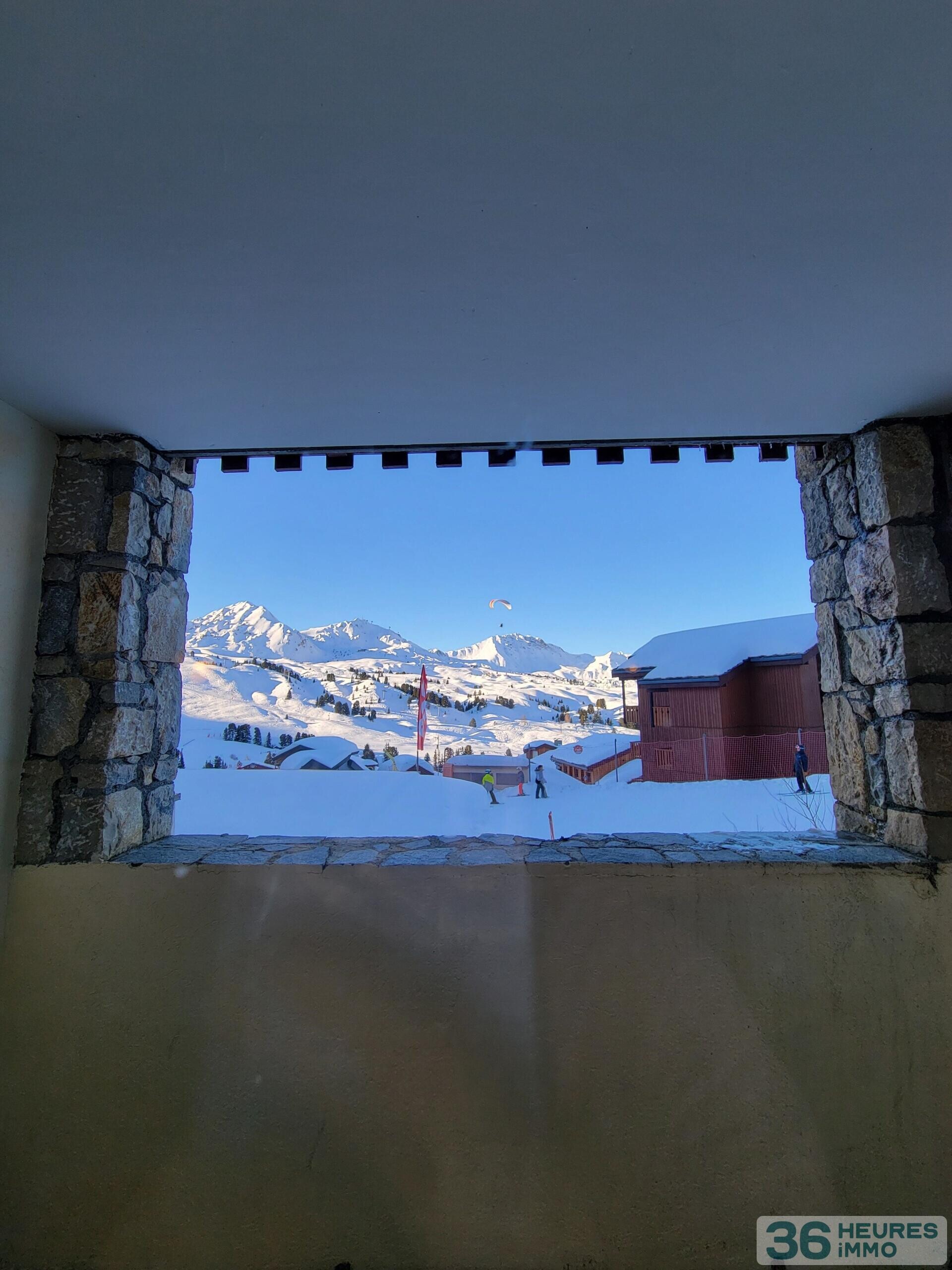 Spacieux appartement avec accès PMR face aux pistes dans une résidence à Belle Plagne haut