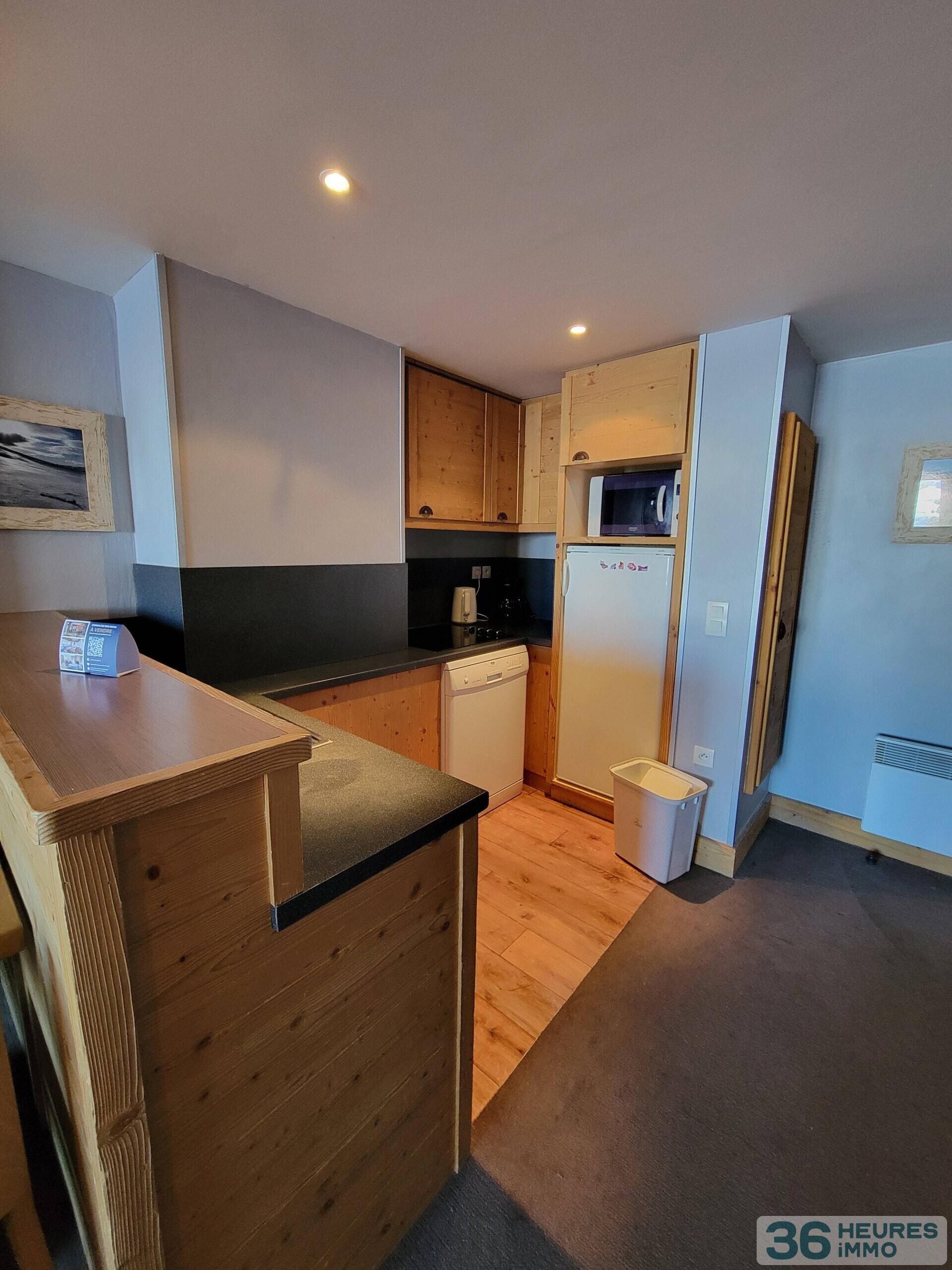 Spacieux appartement avec accès PMR face aux pistes dans une résidence à Belle Plagne haut